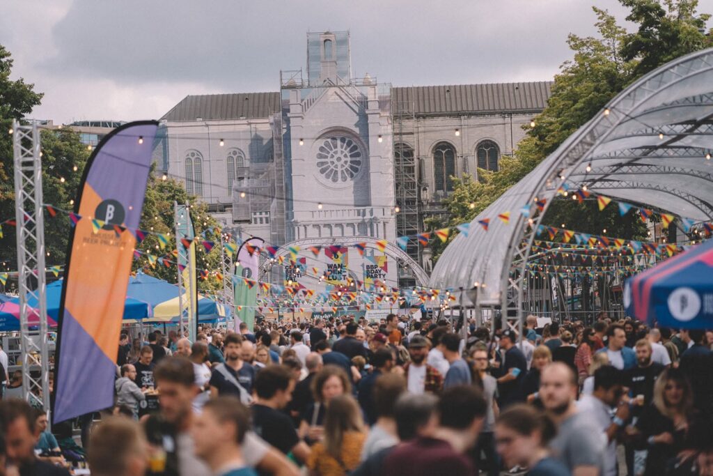 The Wanderlust crowd filling the avenue at Place Sainte-Catherine, Brussels