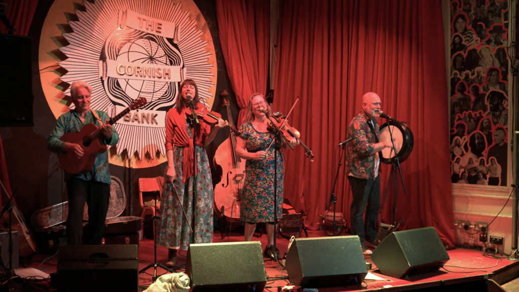 Cornish folk musicians on stage at The Cornish Bank, Falmouth