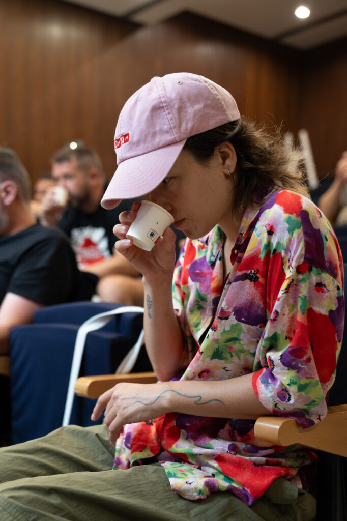 Brewer smelling a spiked sample during the sensory analysis