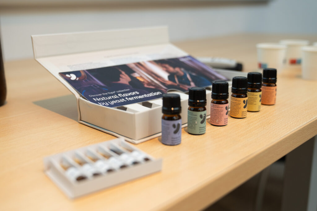 Off-flavour kit with ampoules and aroma bottles on the tasting table