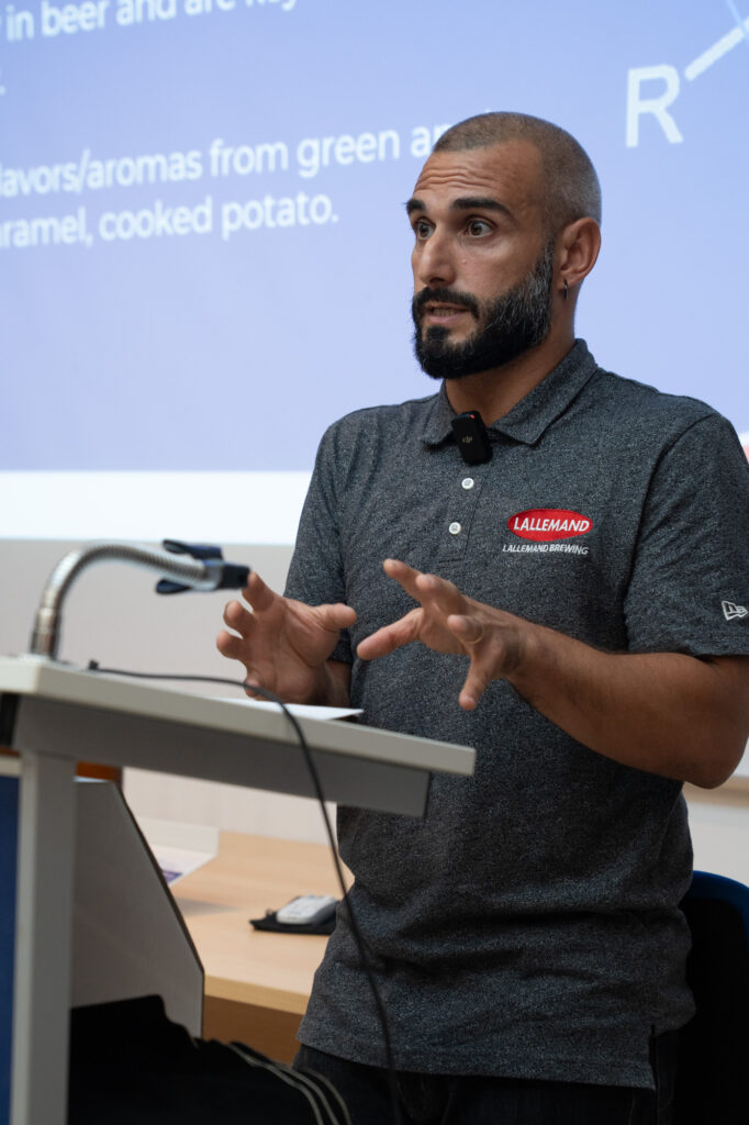 Gianmaria Ricciardi explaining off-flavours at the podium