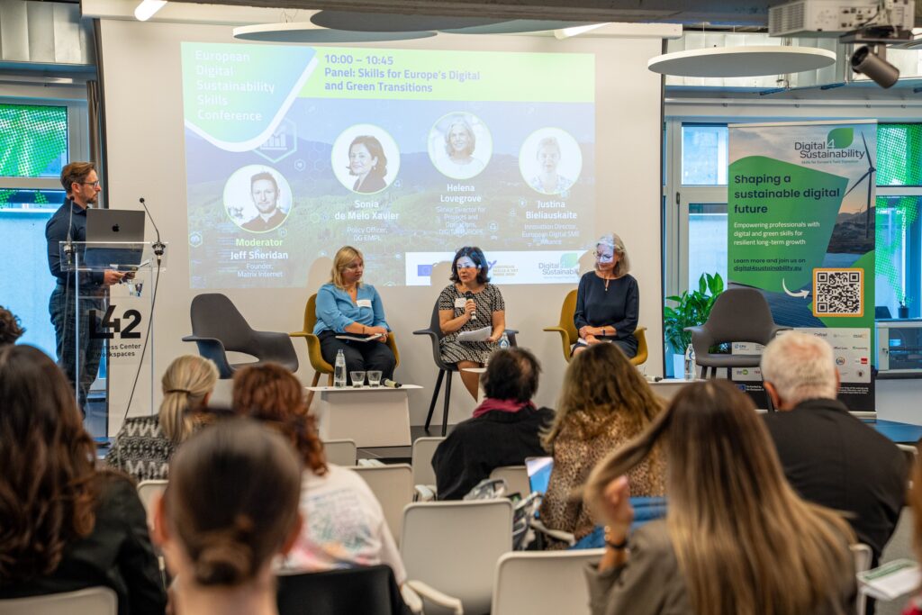 European Digital Sustainability Skills Conference: panel on stage with branded screen and audience, Brussels