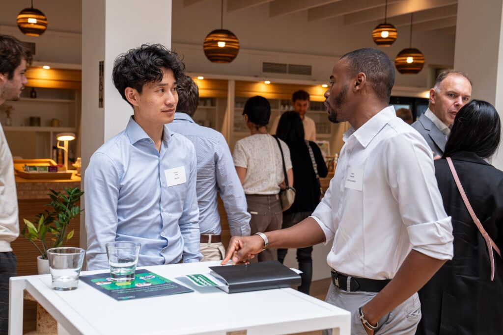 Two participants in conversation during networking
